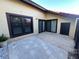 Spacious patio with tile flooring, and sliding glass doors at 547 Hunter Cir # 547, Kissimmee, FL 34758