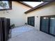 Private patio with tile flooring, and sliding glass doors at 547 Hunter Cir # 547, Kissimmee, FL 34758