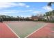 Community basketball court with red and green surface at 7645 Fordson Ln, Windermere, FL 34786