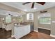 Updated kitchen featuring granite countertops and white cabinets at 830 Overspin Dr, Winter Park, FL 32789