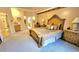 Bright bedroom with a king-size bed and ensuite bathroom at 9217 Shadow Pinar Ct, Orlando, FL 32825