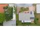 Aerial view showing home, landscaping, and solar panels at 10637 Deergrass Ln, Orlando, FL 32821