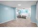 Spa-like bathroom with a large soaking tub, walk-in shower, and beach mural at 10637 Deergrass Ln, Orlando, FL 32821