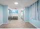 Unique bathroom with beach mural and a large soaking tub at 10637 Deergrass Ln, Orlando, FL 32821