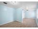 Bright bedroom with light blue walls and wood-look floors at 10637 Deergrass Ln, Orlando, FL 32821