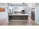Modern kitchen with granite countertops and stainless steel appliances at 10637 Deergrass Ln, Orlando, FL 32821