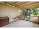 Laundry room with a built-in cabinet and screened enclosure at 10637 Deergrass Ln, Orlando, FL 32821