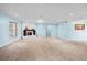 Living room with corner fireplace, tile floors and access to sunroom at 10637 Deergrass Ln, Orlando, FL 32821