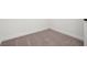 Empty room corner with neutral carpet and white baseboards at 1418 Arbor Hill Dr, Deltona, FL 32725