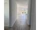 Bright and spacious entryway with wood-look tile flooring at 1425 Arbor Hill Dr, Deltona, FL 32725