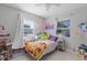 bedroom with a full-size bed and plenty of storage at 15 Volusia Dr, Debary, FL 32713