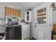 Laundry room with washer, dryer, and extra storage at 15 Volusia Dr, Debary, FL 32713
