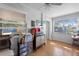 Home office featuring hardwood floors and a large window at 15 Volusia Dr, Debary, FL 32713