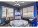 Spacious bedroom with a large circular bed, LED lights, and window shutters at 20 Maynard Ave, Orlando, FL 32803
