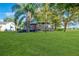 Charming bungalow with a spacious green front lawn at 20 Maynard Ave, Orlando, FL 32803