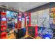 Modern salon with red shelving, large mirror, and comfortable styling stations at 20 Maynard Ave, Orlando, FL 32803