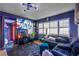 Spacious living room with sectional sofa and large TV at 20 Maynard Ave, Orlando, FL 32803