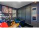 Room with dark walls, large closet, and comfortable seating at 20 Maynard Ave, Orlando, FL 32803