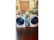 Functional laundry room with side-by-side washer and dryer at 222 5Th St, Winter Haven, FL 33880