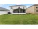 Two story house with backyard and screened patio at 333 Fairfield Dr, Sanford, FL 32771