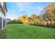 Spacious backyard with lush lawn and privacy fence at 3867 Grassland Loop, Lake Mary, FL 32746