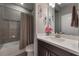 Well-lit bathroom with a tub and vanity at 3867 Grassland Loop, Lake Mary, FL 32746