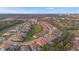 Aerial view of upscale community with various houses and green spaces at 3867 Grassland Loop, Lake Mary, FL 32746