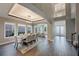Spacious dining room with hardwood floors and modern light fixture at 3867 Grassland Loop, Lake Mary, FL 32746