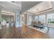Elegant dining room with hardwood floors and ample natural light at 3867 Grassland Loop, Lake Mary, FL 32746
