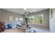Bright home gym with window views and exercise equipment at 3867 Grassland Loop, Lake Mary, FL 32746