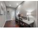 Convenient home office with desk, chairs, and hardwood floors at 3867 Grassland Loop, Lake Mary, FL 32746