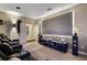 State-of-the-art home theater with reclining seats and large screen at 3867 Grassland Loop, Lake Mary, FL 32746