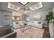 Spacious living room with white sofas, a coffee table and hardwood floors at 3867 Grassland Loop, Lake Mary, FL 32746