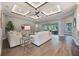 Bright living room with hardwood floors, sliding glass doors, and a view of the backyard at 3867 Grassland Loop, Lake Mary, FL 32746