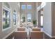 Bright living room featuring high ceilings and ample natural light at 3867 Grassland Loop, Lake Mary, FL 32746