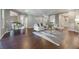 Spacious living area with hardwood floors and modern furniture at 3867 Grassland Loop, Lake Mary, FL 32746