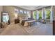 Bright main bedroom with large windows, plush bedding, and plenty of space at 3867 Grassland Loop, Lake Mary, FL 32746