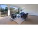 Relaxing screened balcony with outdoor seating and nature views at 3867 Grassland Loop, Lake Mary, FL 32746