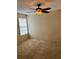 Bright bedroom with carpeted floor and ceiling fan at 485 Forestway Cir # 202, Altamonte Springs, FL 32701