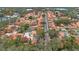 Aerial view of a community with numerous houses and lush landscaping at 5027 Jamaica Cir # 7, Orlando, FL 32808