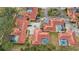 Aerial view of multiple homes with private pools and lush landscaping at 5027 Jamaica Cir # 7, Orlando, FL 32808