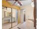 Bathroom with double vanity and large mirrored closet at 5027 Jamaica Cir # 7, Orlando, FL 32808