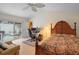 Bedroom with pool view and built-in workspace at 5027 Jamaica Cir # 7, Orlando, FL 32808