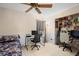 Bedroom with a bed, desk, and gaming setup at 5027 Jamaica Cir # 7, Orlando, FL 32808