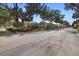 Island Club community entrance with gated access and lush landscaping at 5027 Jamaica Cir # 7, Orlando, FL 32808