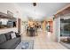 Bright dining area with a glass table and view into the living room and kitchen at 5027 Jamaica Cir # 7, Orlando, FL 32808