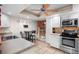 Kitchen with stainless steel appliances and a breakfast bar at 5027 Jamaica Cir # 7, Orlando, FL 32808