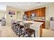 Modern kitchen with stainless steel appliances and large island at 8327 Riverdale Ln, Davenport, FL 33896