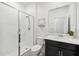 Modern bathroom with a shower, toilet and vanity at 953 Splash Shot Pl # 953, Davenport, FL 33896