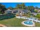Luxury waterfront property with pool, putting green, and private dock at 100 Blue Lake Ct, Longwood, FL 32779